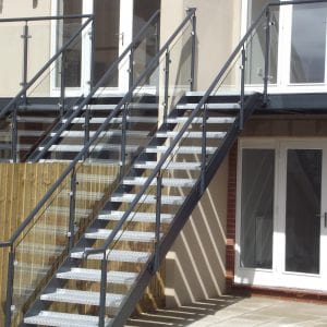 glass balustrade dorset stainless steel frameless poole glass fence steel partition postless balcony polished aluminium no handrail glass welding fabrication stairs staircase dorset poole weymouth portland bournemouth westbourne parkstone dorset ferndown verwood wimborne branksome channel pfc box section shs lintle builders beam flat alteration glass walling ringwood hampshire schools garden idea interior design helical curved round mesh platform floors structural calculations design southern fabrication fineline balconette juliette posiglaze channel fixing partition 10mm glass 21.5 laminate pvb interlayer fabricator site canopy no posts balcony ace hi tech